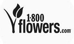 Black and white logo for 1-800-Flowers, featuring a stylized flower with two petals to the left of the company name in bold text.